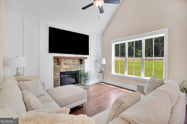 35 Cornish Creek Ln, Covington, GA 30014 - living room featuring a ceiling fan, wood finished floors, high vaulted ceiling, and a fireplace