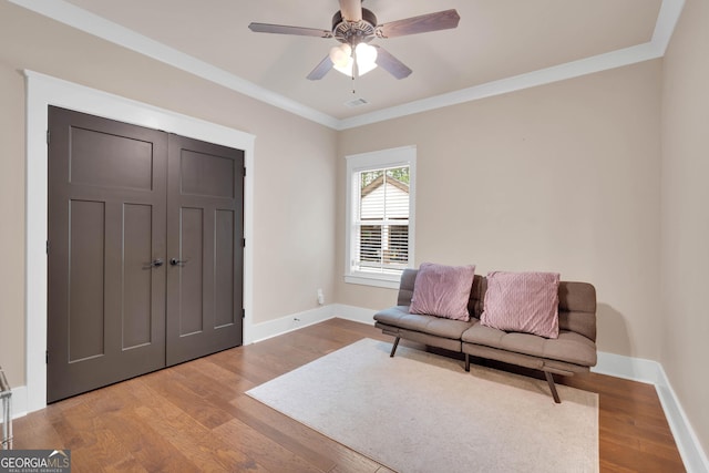 35 Cornish Creek Ln, Covington, GA 30014 - sitting room with ornamental molding, wood finished floors, and a ceiling fan