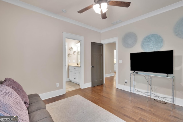 35 Cornish Creek Ln, Covington, GA 30014 - living area with ceiling fan, wood finished floors, and ornamental molding