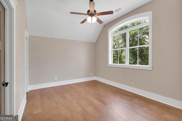 35 Cornish Creek Ln, Covington, GA 30014 - bonus room featuring hardwood / wood-style floors, vaulted ceiling, and a ceiling fan