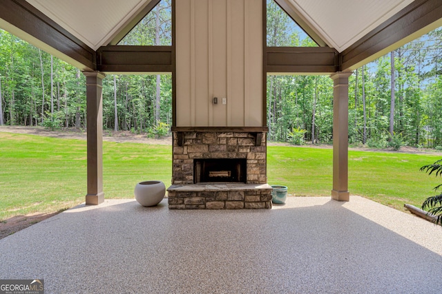 35 Cornish Creek Ln, Covington, GA 30014 - view of patio / terrace with an outdoor stone fireplace
