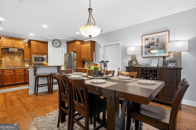 348 Willow Pointe Dr, Lagrange, GA 30240 - dining space featuring ornamental molding, light wood-style flooring, and recessed lighting