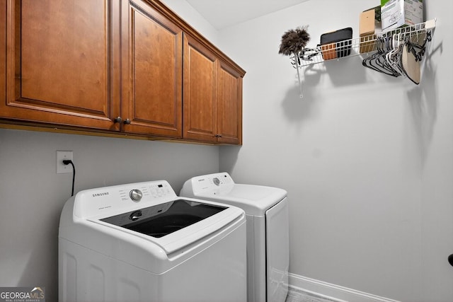 348 Willow Pointe Dr, Lagrange, GA 30240 - laundry area with washer and dryer and cabinet space