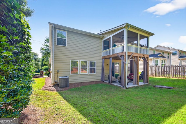 6131 Sparkling Cove Ln, Buford, GA 30518 - rear view of house with a patio area and a sunroom