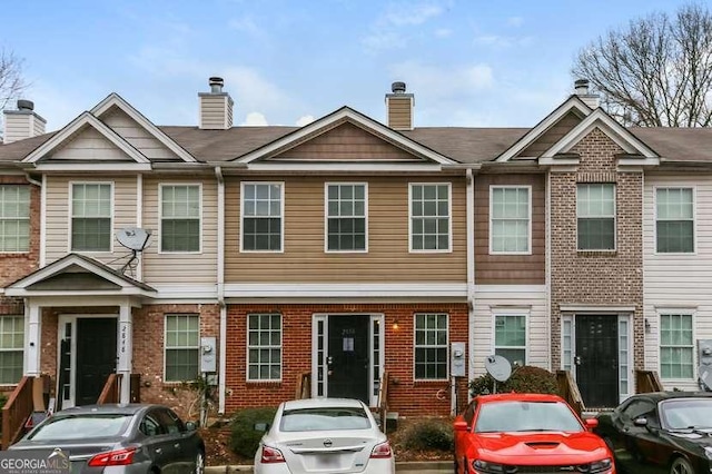2850 Vining Ridge Ter, Decatur, GA 30034 - view of property featuring brick siding and a chimney