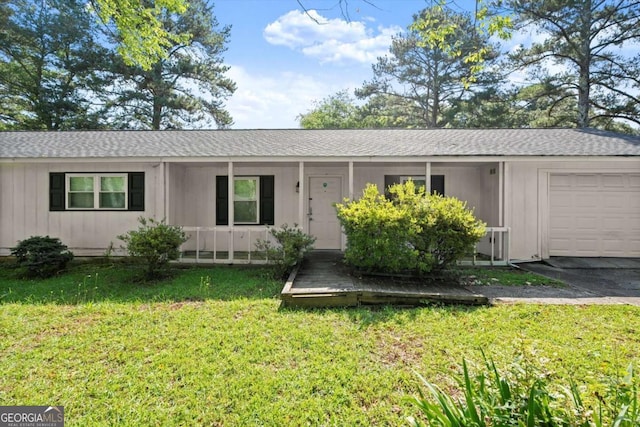 1799 Harmony Rd, Powder Springs, GA 30127 - single story home featuring an attached garage, roof with shingles, a front lawn, and covered porch
