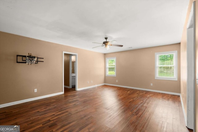 1799 Harmony Rd, Powder Springs, GA 30127 - unfurnished room with healthy amount of natural light, dark wood-type flooring, and a ceiling fan