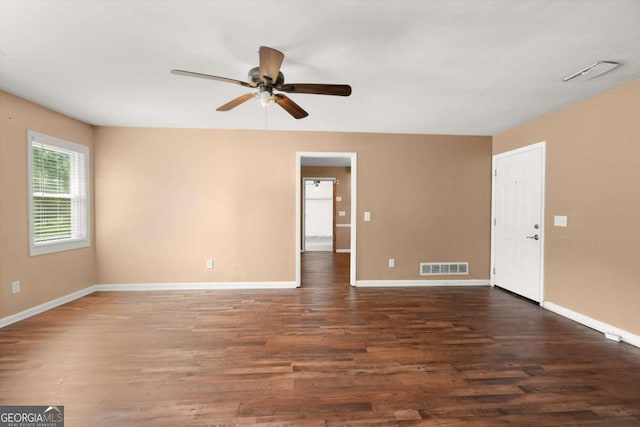 1799 Harmony Rd, Powder Springs, GA 30127 - spare room with dark wood-type flooring and ceiling fan