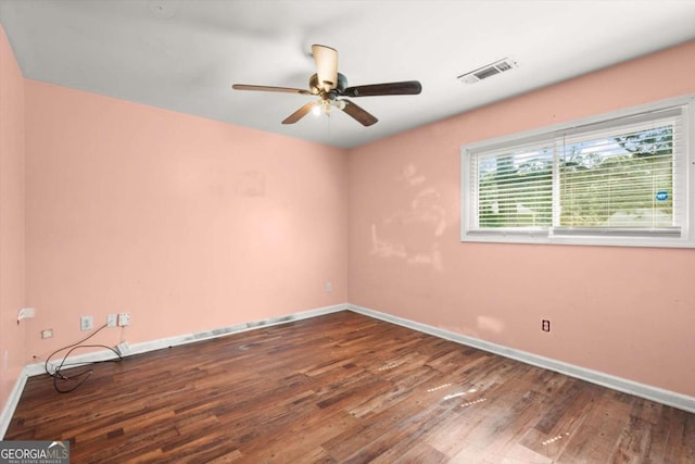 1799 Harmony Rd, Powder Springs, GA 30127 - empty room with wood finished floors and a ceiling fan