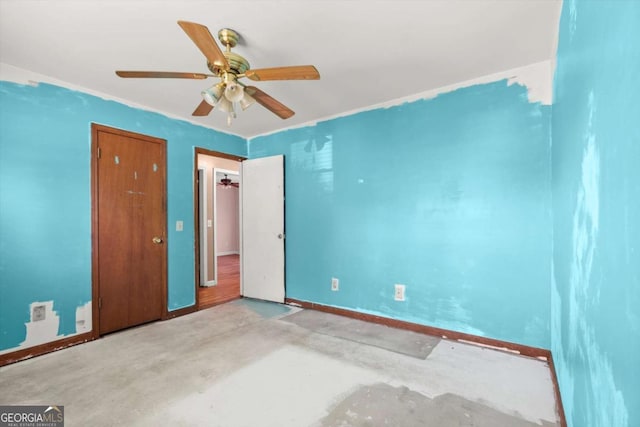 1799 Harmony Rd, Powder Springs, GA 30127 - unfurnished bedroom featuring concrete floors and a ceiling fan