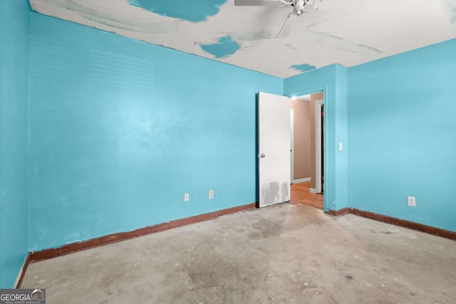 1799 Harmony Rd, Powder Springs, GA 30127 - spare room featuring concrete floors and ceiling fan