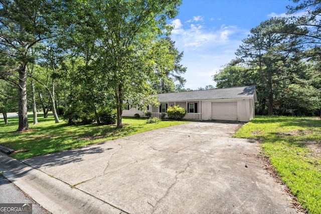 1799 Harmony Rd, Powder Springs, GA 30127 - ranch-style house with a garage, concrete driveway, and a front lawn