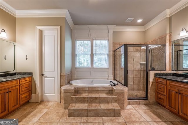 6186 Talmadge Run NW, Acworth, GA 30101 - full bath with plenty of natural light, vanity, a garden tub, and ornamental molding