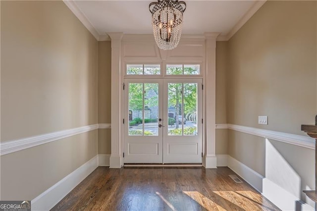 6186 Talmadge Run NW, Acworth, GA 30101 - doorway to outside with a chandelier, wood finished floors, ornamental molding, and french doors
