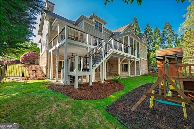 6186 Talmadge Run NW, Acworth, GA 30101 - rear view of property featuring a playground, stairway, brick siding, and ceiling fan