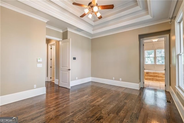 6186 Talmadge Run NW, Acworth, GA 30101 - unfurnished room featuring a raised ceiling, dark wood-style flooring, ceiling fan, and crown molding