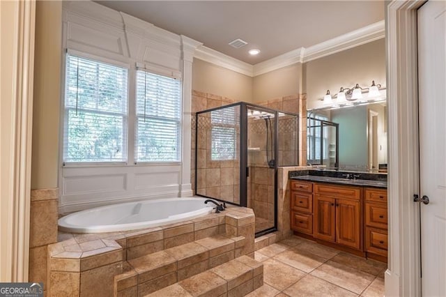6186 Talmadge Run NW, Acworth, GA 30101 - bathroom featuring a bath, vanity, a shower stall, ornamental molding, and tile patterned flooring