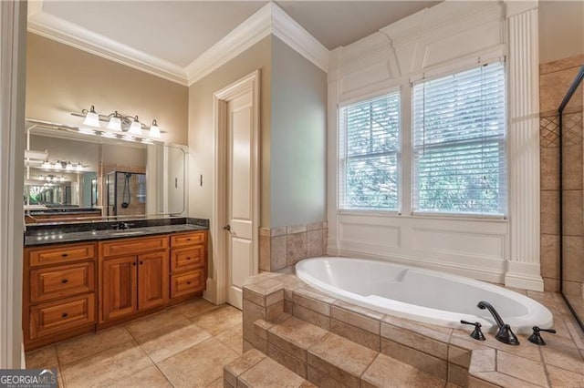6186 Talmadge Run NW, Acworth, GA 30101 - bathroom featuring crown molding, a garden tub, vanity, tile patterned flooring, and tiled shower