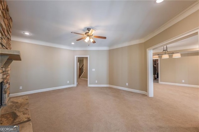 6186 Talmadge Run NW, Acworth, GA 30101 - unfurnished living room with a fireplace, ceiling fan, light carpet, crown molding, and recessed lighting