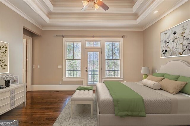 6186 Talmadge Run NW, Acworth, GA 30101 - bedroom with dark wood-style flooring, access to exterior, crown molding, a raised ceiling, and ceiling fan