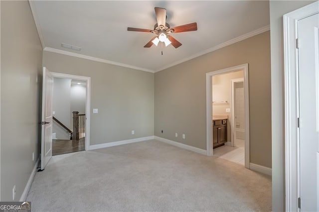 6186 Talmadge Run NW, Acworth, GA 30101 - unfurnished bedroom featuring ornamental molding, light colored carpet, ceiling fan, and connected bathroom