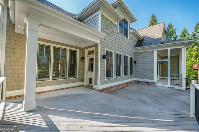 6186 Talmadge Run NW, Acworth, GA 30101 - rear view of property featuring a shingled roof and a wooden deck