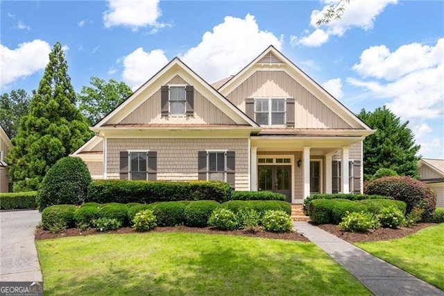 6186 Talmadge Run NW, Acworth, GA 30101 - craftsman-style home with a front yard and covered porch