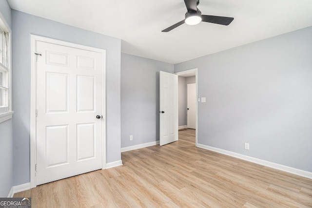 2621 Walton Way SW, Marietta, GA 30060 - unfurnished bedroom featuring light wood-type flooring and a ceiling fan