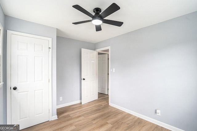 2621 Walton Way SW, Marietta, GA 30060 - unfurnished bedroom with light wood-type flooring and a ceiling fan