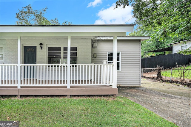 2621 Walton Way SW, Marietta, GA 30060 - back of house featuring brick siding and a porch