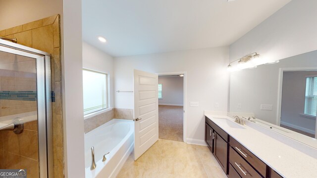 458 Southern Oaks Dr, Macon, GA 31216 - bathroom with vanity, a bath, a stall shower, and tile patterned flooring