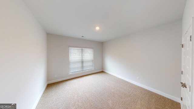 458 Southern Oaks Dr, Macon, GA 31216 - empty room with light carpet and baseboards