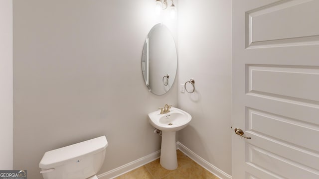 458 Southern Oaks Dr, Macon, GA 31216 - half bath featuring toilet and tile patterned floors