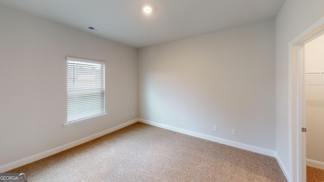 458 Southern Oaks Dr, Macon, GA 31216 - unfurnished room featuring light colored carpet and baseboards