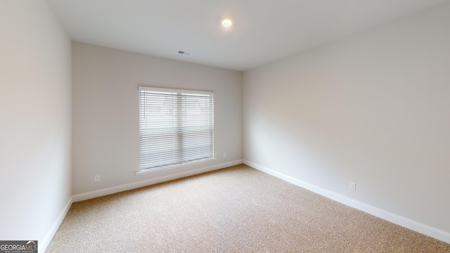458 Southern Oaks Dr, Macon, GA 31216 - spare room featuring carpet flooring and baseboards