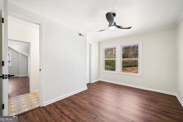 1891 W Forrest Ave, Atlanta, GA 30344 - spare room with wood finished floors, a ceiling fan, and crown molding