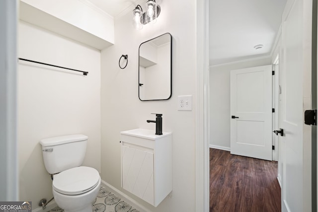 1891 W Forrest Ave, Atlanta, GA 30344 - bathroom with crown molding, vanity, and wood finished floors