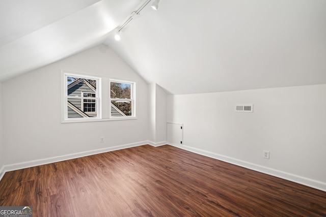 1891 W Forrest Ave, Atlanta, GA 30344 - additional living space featuring wood finished floors and lofted ceiling