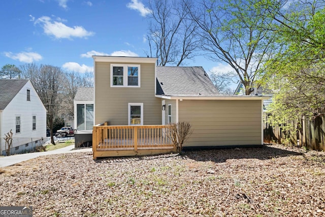 1891 W Forrest Ave, Atlanta, GA 30344 - back of house with roof with shingles and a deck
