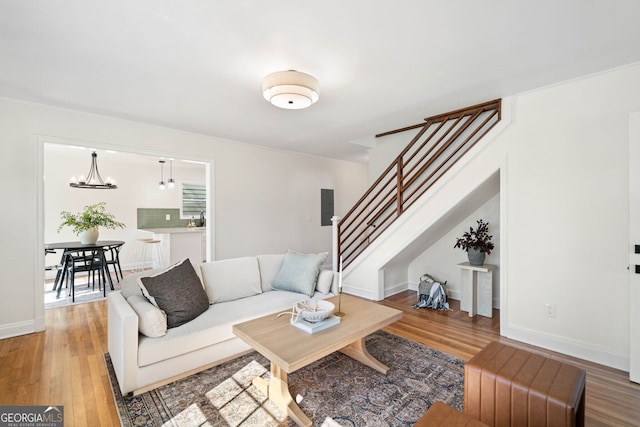 1891 W Forrest Ave, Atlanta, GA 30344 - living room with light wood-type flooring, stairs, and electric panel