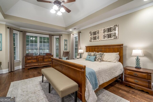 1421 Jack Malcom Rd, Madison, GA 30650 - bedroom with wood finished floors, a tray ceiling, ornamental molding, a ceiling fan, and recessed lighting