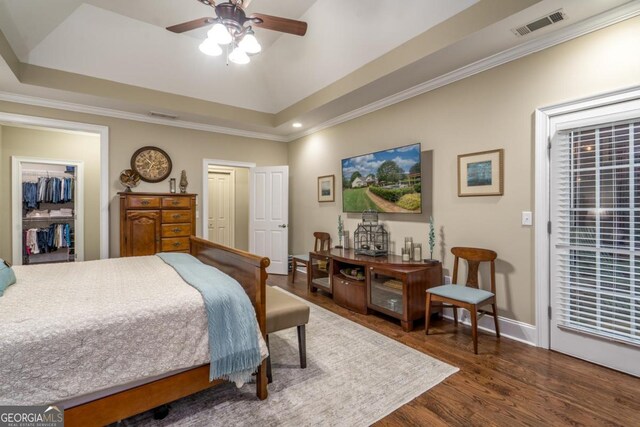 1421 Jack Malcom Rd, Madison, GA 30650 - bedroom with wood finished floors, crown molding, access to outside, a raised ceiling, and ceiling fan