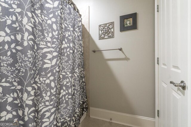 1421 Jack Malcom Rd, Madison, GA 30650 - full bathroom featuring tile patterned floors and curtained shower