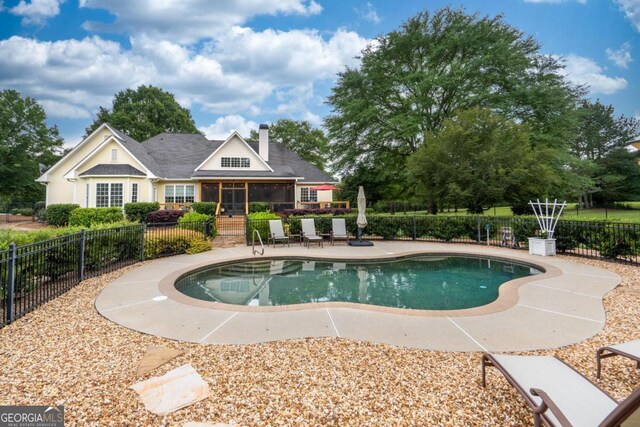 1421 Jack Malcom Rd, Madison, GA 30650 - view of pool featuring a patio area and a sunroom