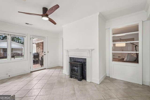 1501 Memory Ln SE, Smyrna, GA 30080 - unfurnished living room featuring ornamental molding, a ceiling fan, a high end fireplace, and light tile patterned flooring
