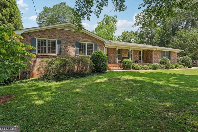 1501 Memory Ln SE, Smyrna, GA 30080 - ranch-style home featuring a porch, brick siding, and a front lawn