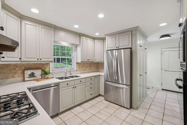 1501 Memory Ln SE, Smyrna, GA 30080 - kitchen featuring appliances with stainless steel finishes, light countertops, light tile patterned floors, tasteful backsplash, and recessed lighting