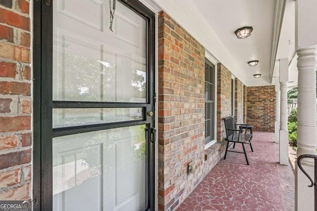 1501 Memory Ln SE, Smyrna, GA 30080 - entrance to property featuring a porch and brick siding