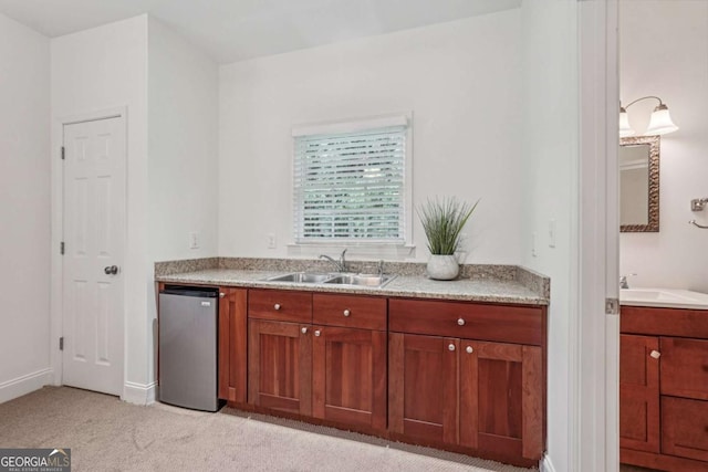 1501 Memory Ln SE, Smyrna, GA 30080 - kitchen featuring dishwasher, light carpet, and light stone countertops