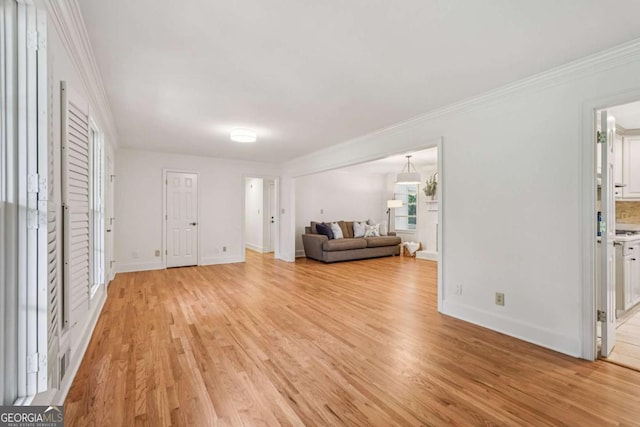 1501 Memory Ln SE, Smyrna, GA 30080 - living area featuring light wood-style floors and ornamental molding